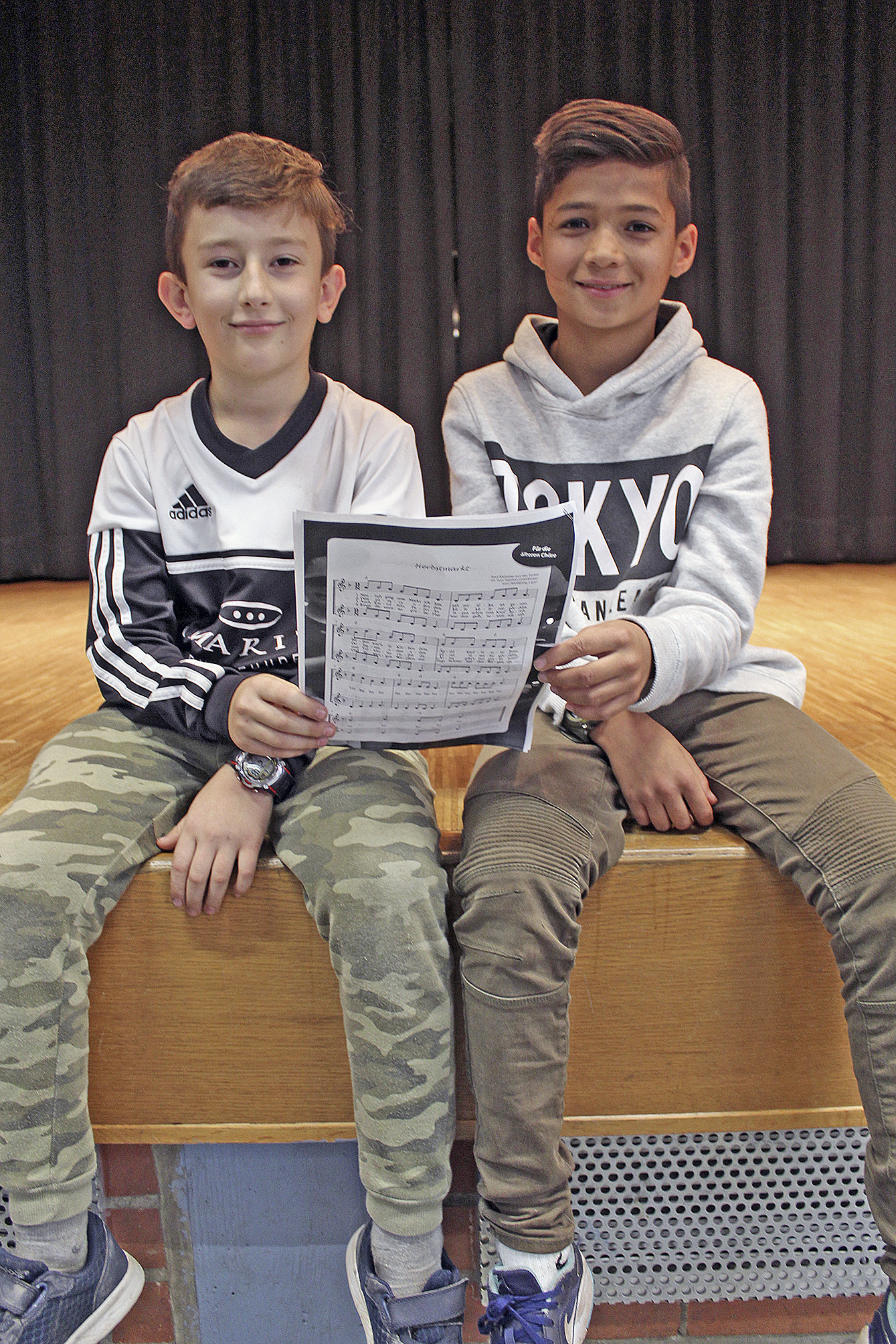 Im Chor singen beide gerne: Ahmed (li.) und Farshad