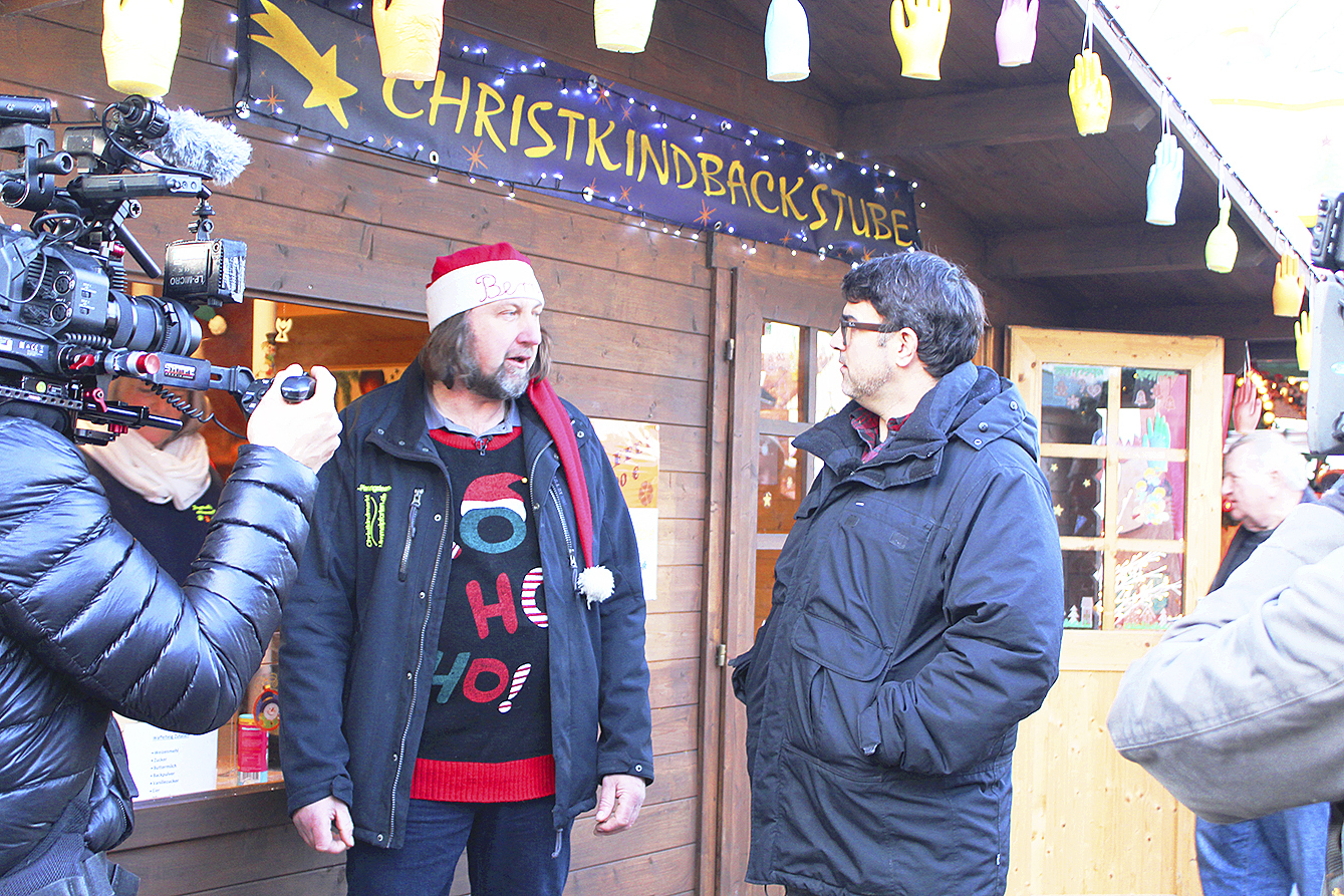 Tarik Rose (re.) im Gespräch mit Bernd Reimers