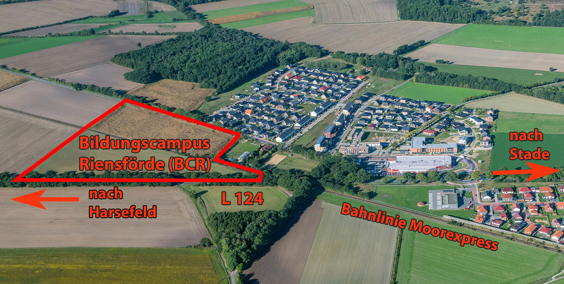 Der neue Stadtteil Riensförde aus der Vogelperspektive. Der Bildungscampus soll ab dem Jahr 2021 in Betrieb gehen Foto: Martin Elsen / www.luftbild.fotograf.de; Repro: jd