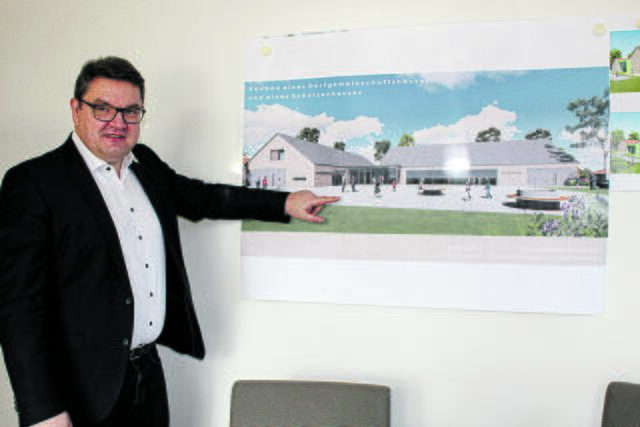 Holger Falcke zeigt eine Visualisierung des neuen Dorfgemeinschaftshauses in Hammah | Foto: sb