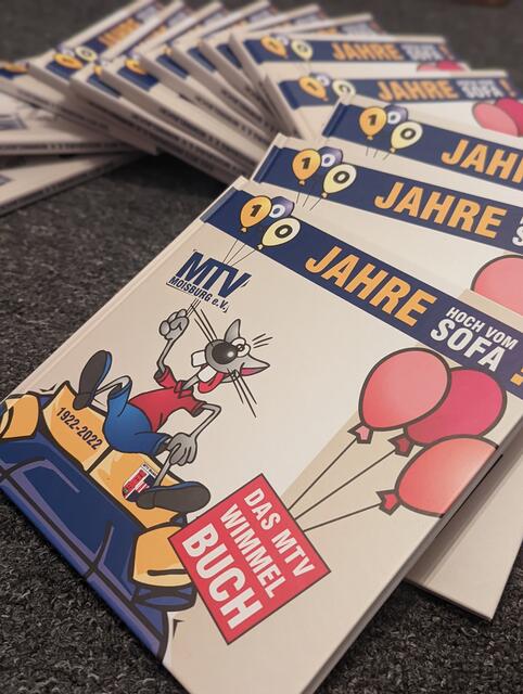Das Wimmelbuch, das extra für die Jubiläumsfeier erstellt wurde | Foto: MTV Moisburg