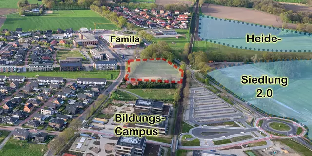 Aldi und Rossmann sollen zwischen Famila und dem Bildungscampus entstehen (rot gestrichelte Fläche). Rechts im Bild die geplante Heidesiedlung 2.0 | Foto: Martin Elsen/nord-luftbilder.de