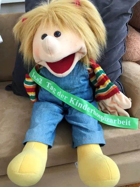 Ein zentrales Symbol des Kinderhospiztages ist das grüne Band. | Foto: Ambulanter Hospizdienst Winsen