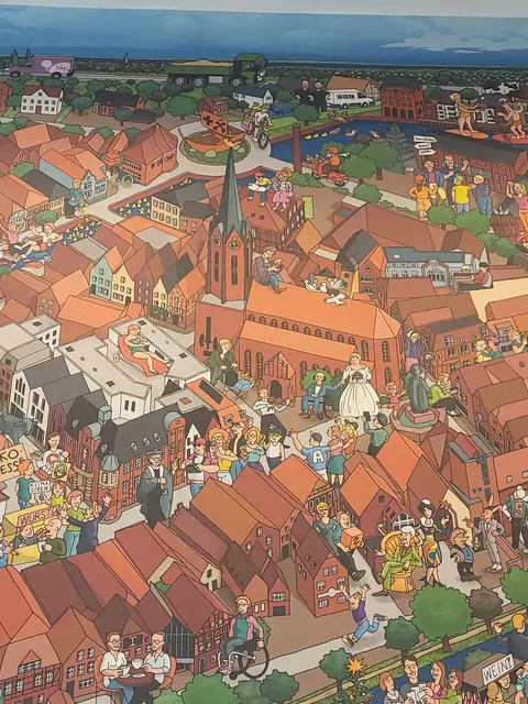 Ein Ausschnitt aus dem Wimmelbild der Künstler Ulrich Schaper und Lesprenger in der Kalle-Gerloff-Schule zeigt, wie gesellschaftliche Teilhabe aussieht: Das Brautpaar vor der Kirche ist ein Paar der Lebenshilfe | Foto: wd